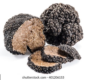 Black Truffles Isolated On A White Background.