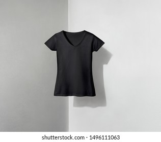Black T-shirt for Lady on Shadowed Background