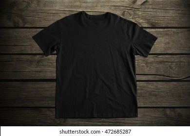 Black T-shirt On Wood