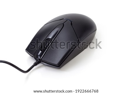 Black typical wired optical computer mouse with two buttons and scroll wheel on a white background, close-up 