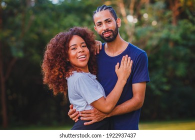 Black Valentine Couple In The Park In Love. Passionate Couple Of Lovers. Valentine's Day Concept