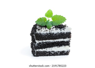 Black  Velvet Cake Slice Decorated With White Cream Isolated On White 