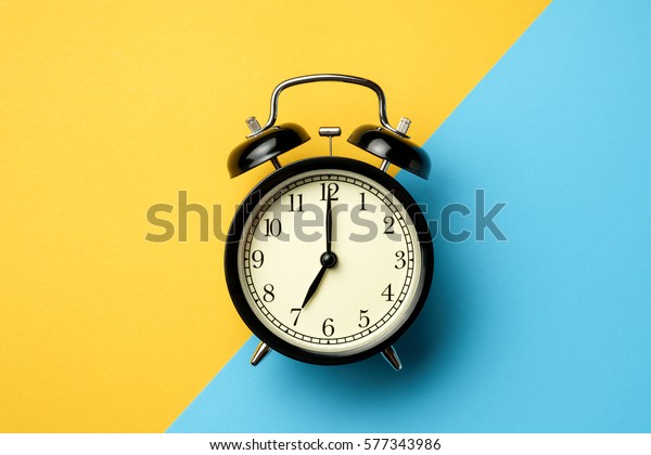 Black Vintage Alarm Clock On Two ภาพสต อก แก ไขตอนน 577343986