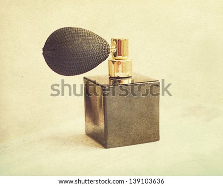 black vintage bottle of perfume, retro