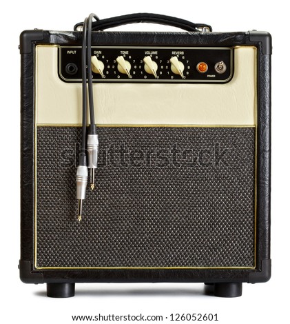 black vintage guitar aplifier with cable, isolated on white