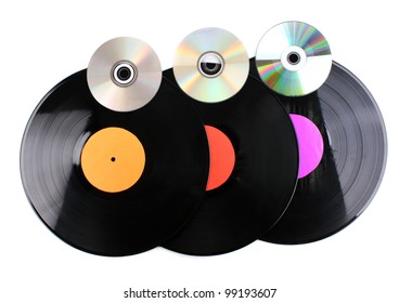 Black Vinyl Records And CD Disks Isolated On White