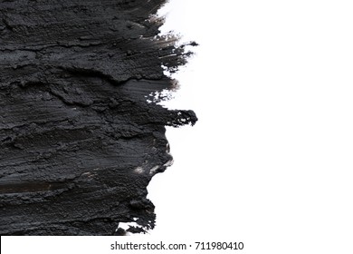 Black Volcanic Cosmetic Clay Texture Close Up. Solution Of Cosmetic Clay Abstract Background.