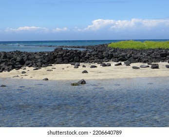 Black Volcanic Rock Beach In Hawaii