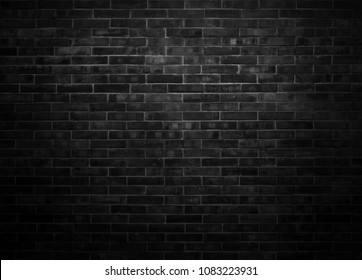 Black wall background The surface of the brick dark jagged. Abstract black wall background