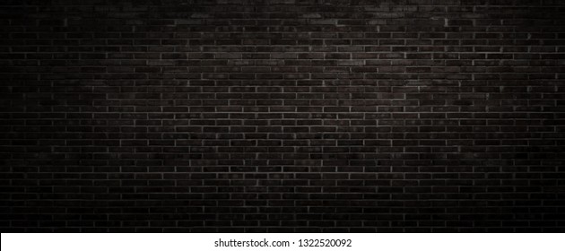 The black wall surface uses a lot of bricks. Or old black brick wall abstract pattern. Put together beautifully dark background. - Shutterstock ID 1322520092