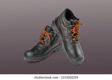 Black Warm Boots With Orange Laces, Hiking Boots, Warm Work Boots, Men's Shoes, Color Background Close-up Selective Focus