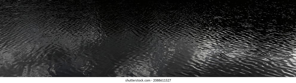 Black Water In The Ocean, Black And White Glare On The Water. Shimmer On The Water