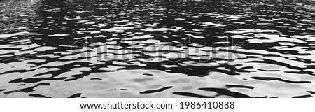 black water sea wave. black water texture banner. water reflection texture background. Dark water website banner. Ocean surface background. Black and white oil paint texture.