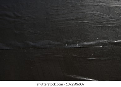 Black Weathered Glued Street Poster Texture Background Surface