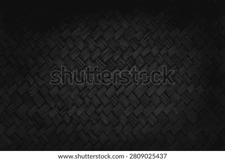Black weave bamboo pattern, woven rattan mat texture for background and design art work.