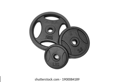 black weight plates on white background