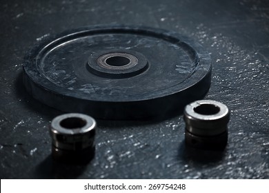 black weight for the rod lying on the floor