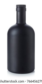 Black whiskey bottle isolated on white background