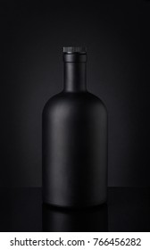 Black Whiskey Bottle On Dark Background