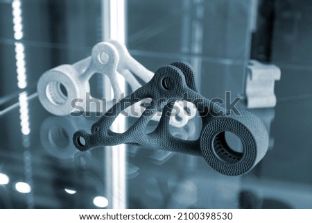 Black and white abstract models printed on 3d printer from powder close-up. 3D prototype created by additive 3d printing technology. Multi Jet Fusion MJF. Concept new modern hi-technology 3d printing