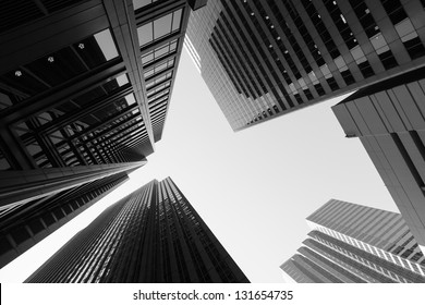 Black and white abstract upward view of downtown skyscrapers. - Shutterstock ID 131654735