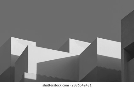 Black and White Architecture Abstract Modern Building in Minimal Style. Exterior Geometric House Wall Background with Light and Shadow on Concrete Surface in Perspective low Angle view - Powered by Shutterstock