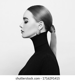 Black And White Art Studio Portrait Of A Beautiful Elegant Woman In A Black Turtleneck.