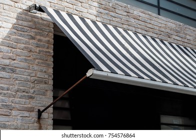 Black And White Awning Over A Window