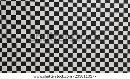 black and white background checkered chessboard motif