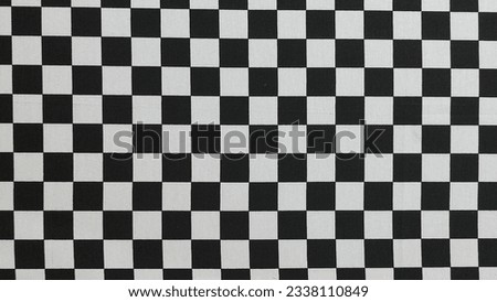 black and white background checkered chessboard motif