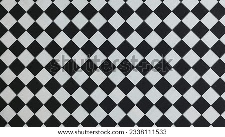 black and white background checkered chessboard motif