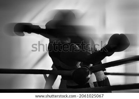 Black and white background image on the theme of boxing.  Combat sports. Silhouettes without faces.