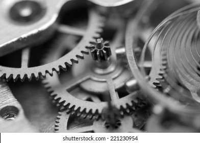 Black white background with metal cogwheels a clockwork. Conceptual photo for your successful business design. Macro.  