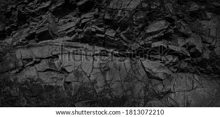  Black and white background. Volumetric black stone background. 3d effect. Rock texture. Granite mountain texture. Close-up.                              