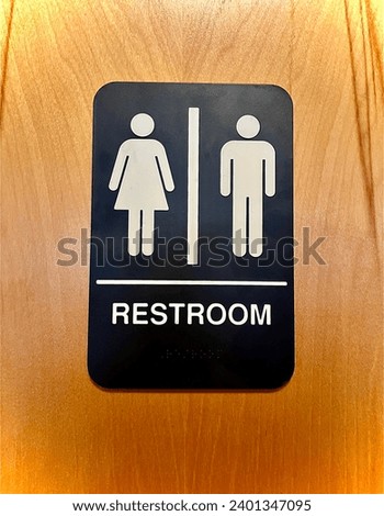 Black and white Bathroom sign for female and male