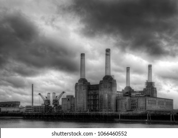 Black and white Battersea power station against a dark stormy sky before local develoments changing the iconic skyline