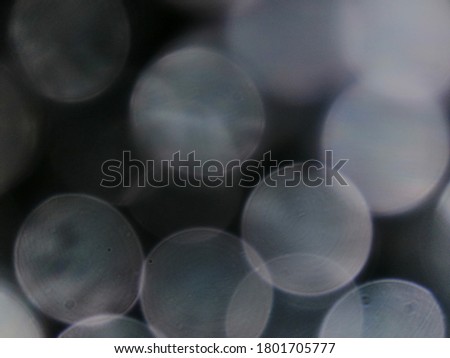  black and white bukeh lights in circle shape abtrack background 