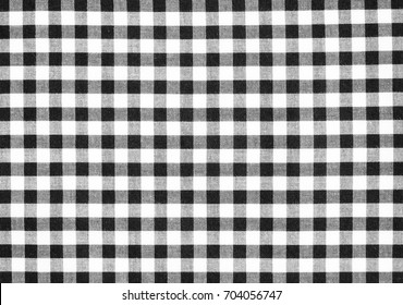 Black and white checked pattern linen fabric texture background, detail closeup