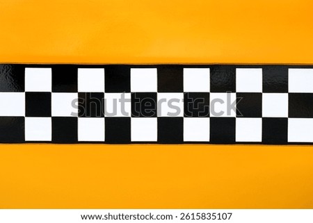Black and white checkered pattern on yellow background, inspired by New York yellow cab taxi vehicle design. Copy space included.