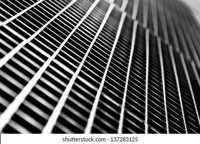 Black   white close up sidewalk subway grate and shallow depth field 