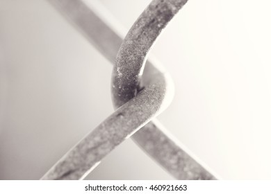 Black and White Close up of a single link in a fence