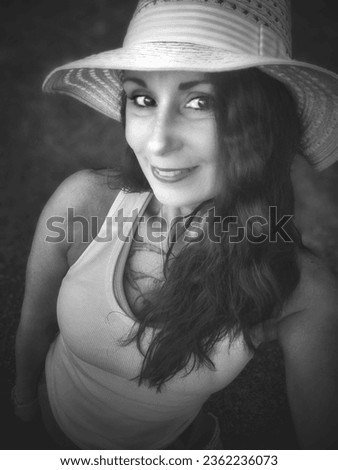 Similar – Image, Stock Photo Smiling girl with a hat pulling from her boyfriend hand in the street to take a walk.