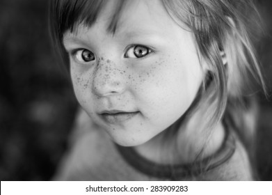 Black And White Closeup Portrait Of Beautiful Girl With Big Expressive Eyes