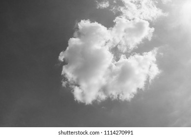 black and white clouds and sky. Dramatic sunlight of blue sky and clouds in Black and White. Black and white clouds texture on the dark sky background abstract.
