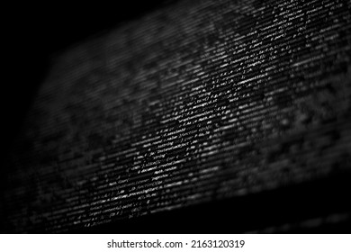 Black and white code background. javascript code on computer screen - Powered by Shutterstock