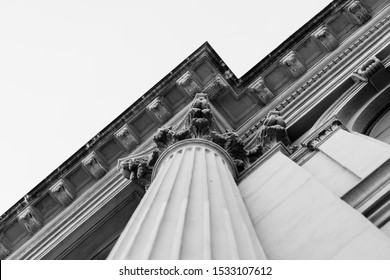 A black and white Column detail corner of a historical building.