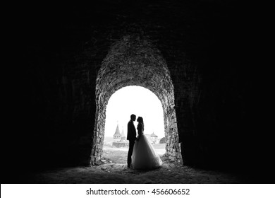 Black And White Contour Of  Bride And Groom On Background With Castle