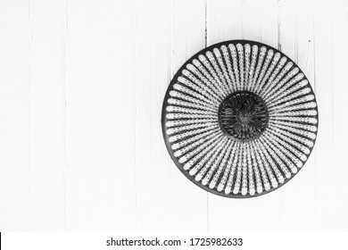 Black And White Contrast Of A Light Fixture On The Ceiling Of My Porch.