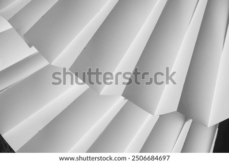 Black and white corrugated surface, background for decoration. Pleating.