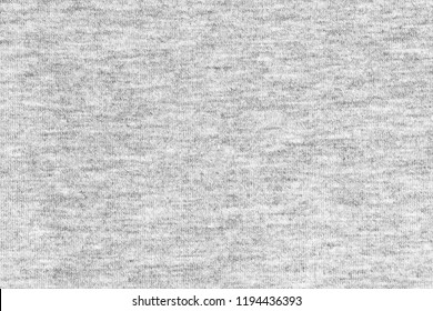 Black and white cotton fabric heather background.
Close up gray cotton fabric texture background.  
White textured knit. 
Selective focus.
top view. - Shutterstock ID 1194436393